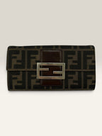 Fendi brown long wallet with Zucca FF monogram canvas and oversized logo buckle.