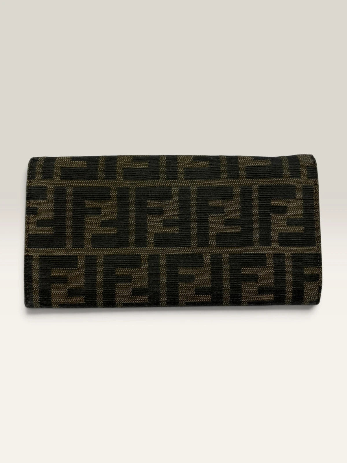 Fendi brown long wallet with Zucca FF monogram canvas and oversized logo buckle.