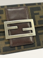 Fendi brown long wallet with Zucca FF monogram canvas and oversized logo buckle.