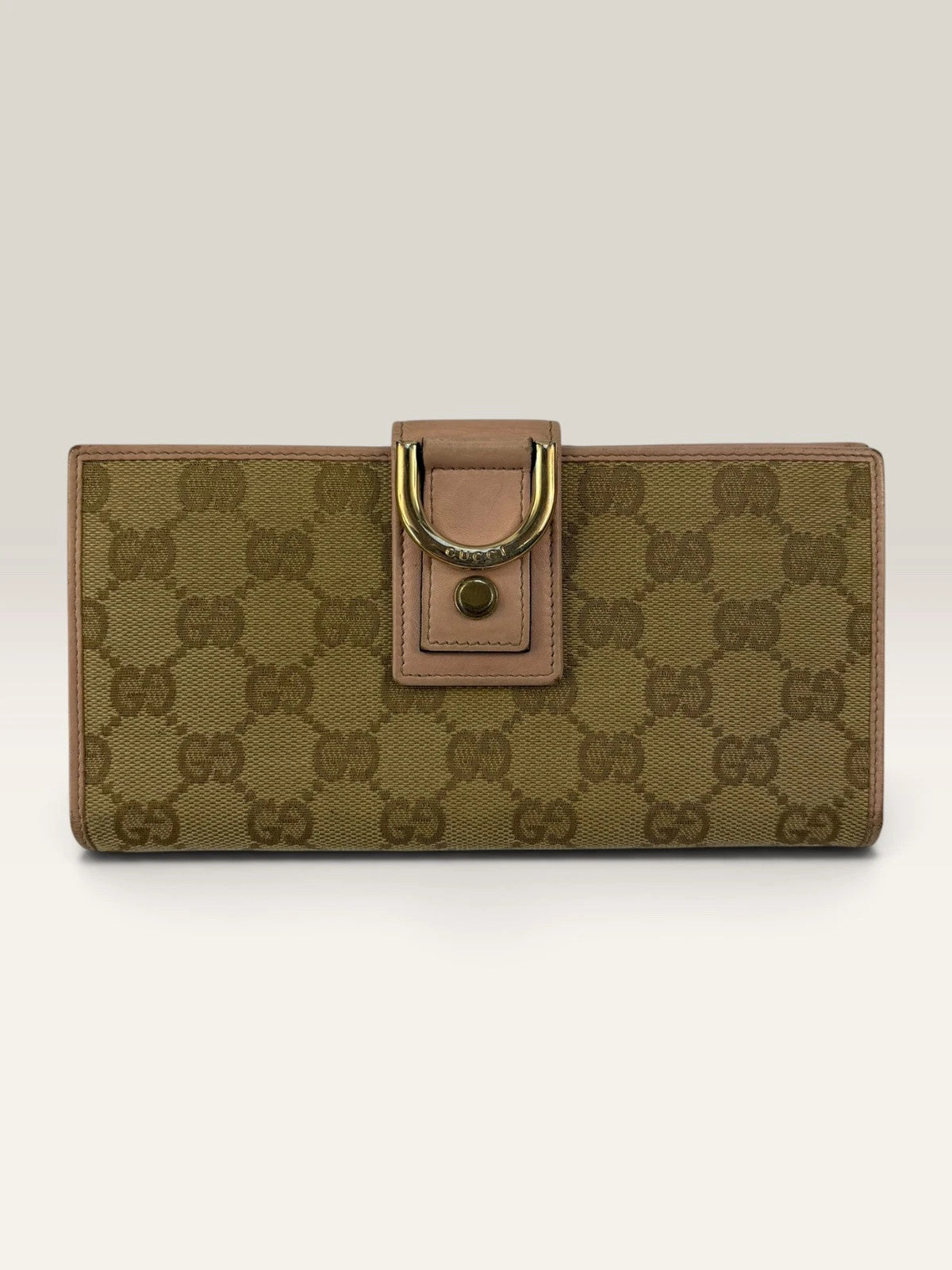 Gucci beige pink long wallet GG canvas with gold-tone Horsebit clasp and leather trim.