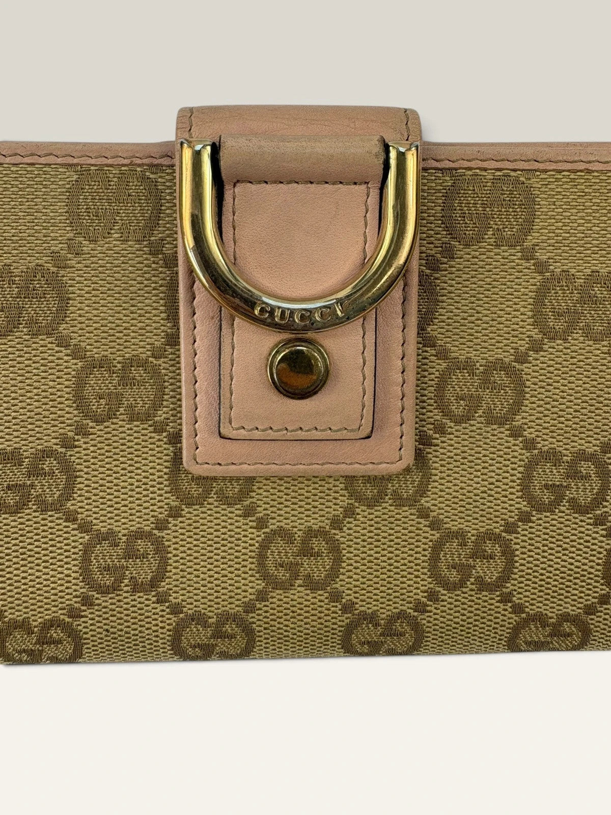 Gucci beige pink long wallet GG canvas with gold-tone Horsebit clasp and leather trim.