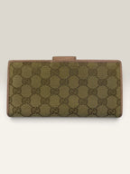 Gucci beige pink long wallet GG canvas with gold-tone Horsebit clasp and leather trim.