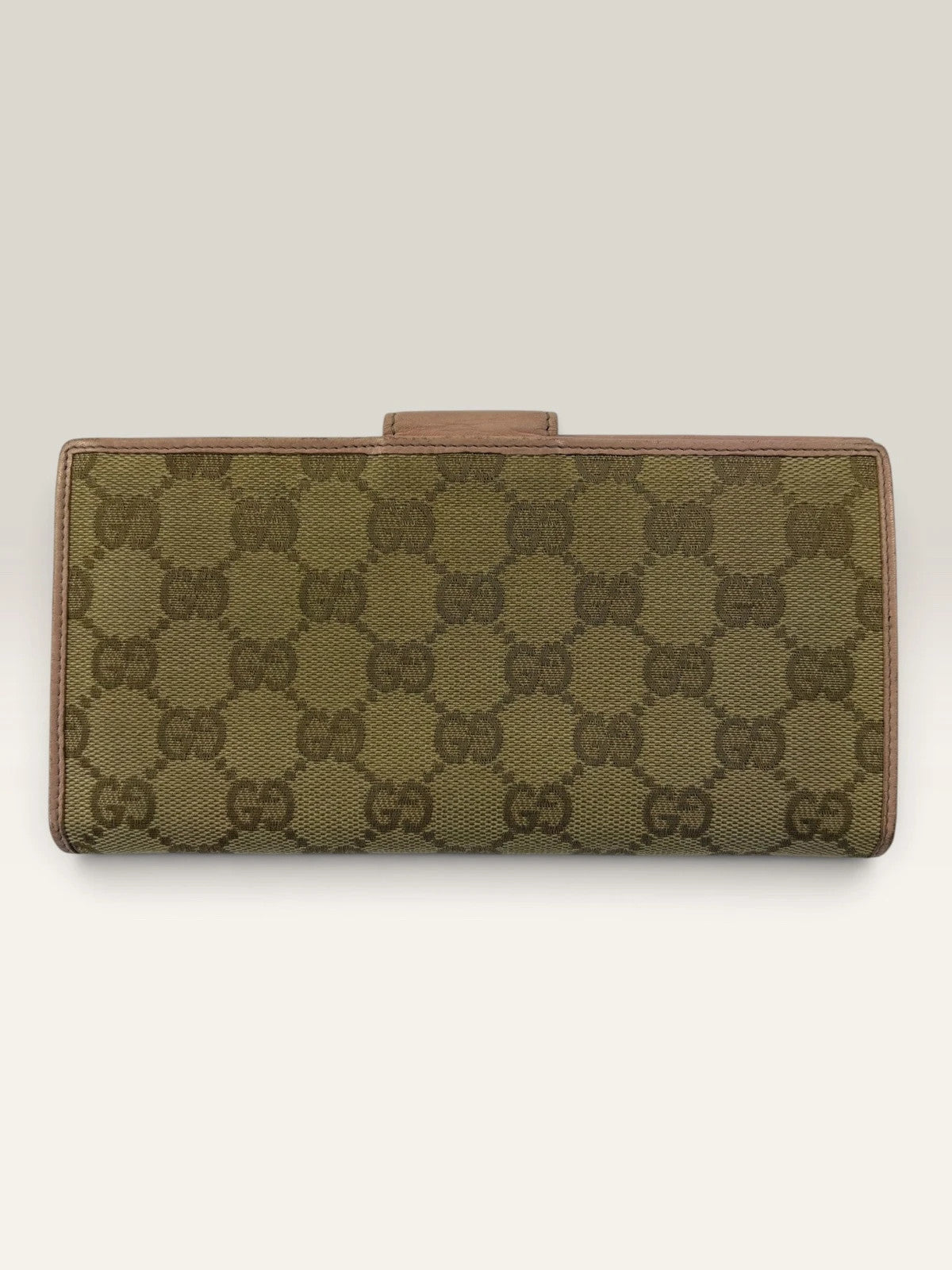 Gucci beige pink long wallet GG canvas with gold-tone Horsebit clasp and leather trim.