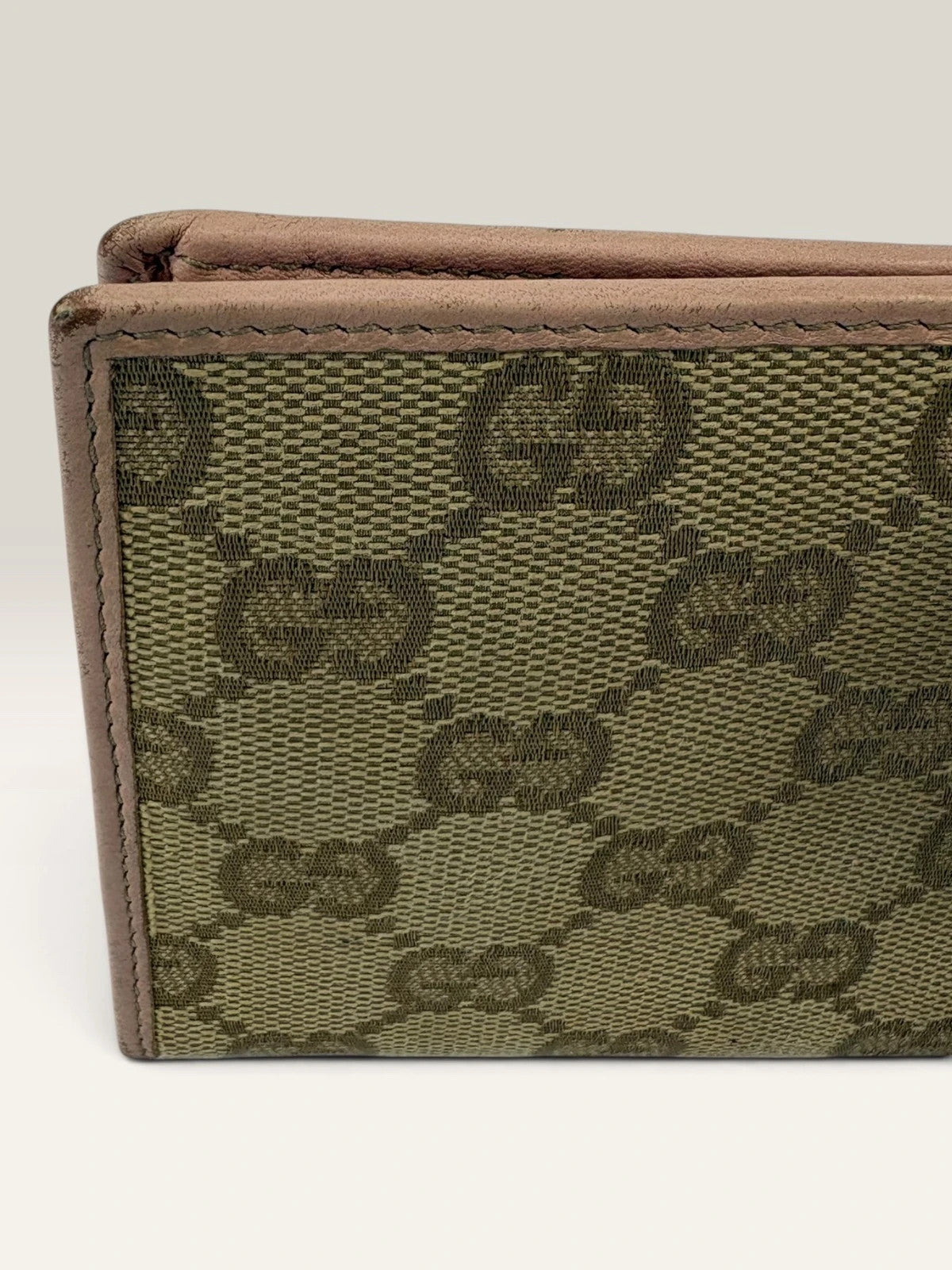 Gucci beige pink long wallet GG canvas with gold-tone Horsebit clasp and leather trim.
