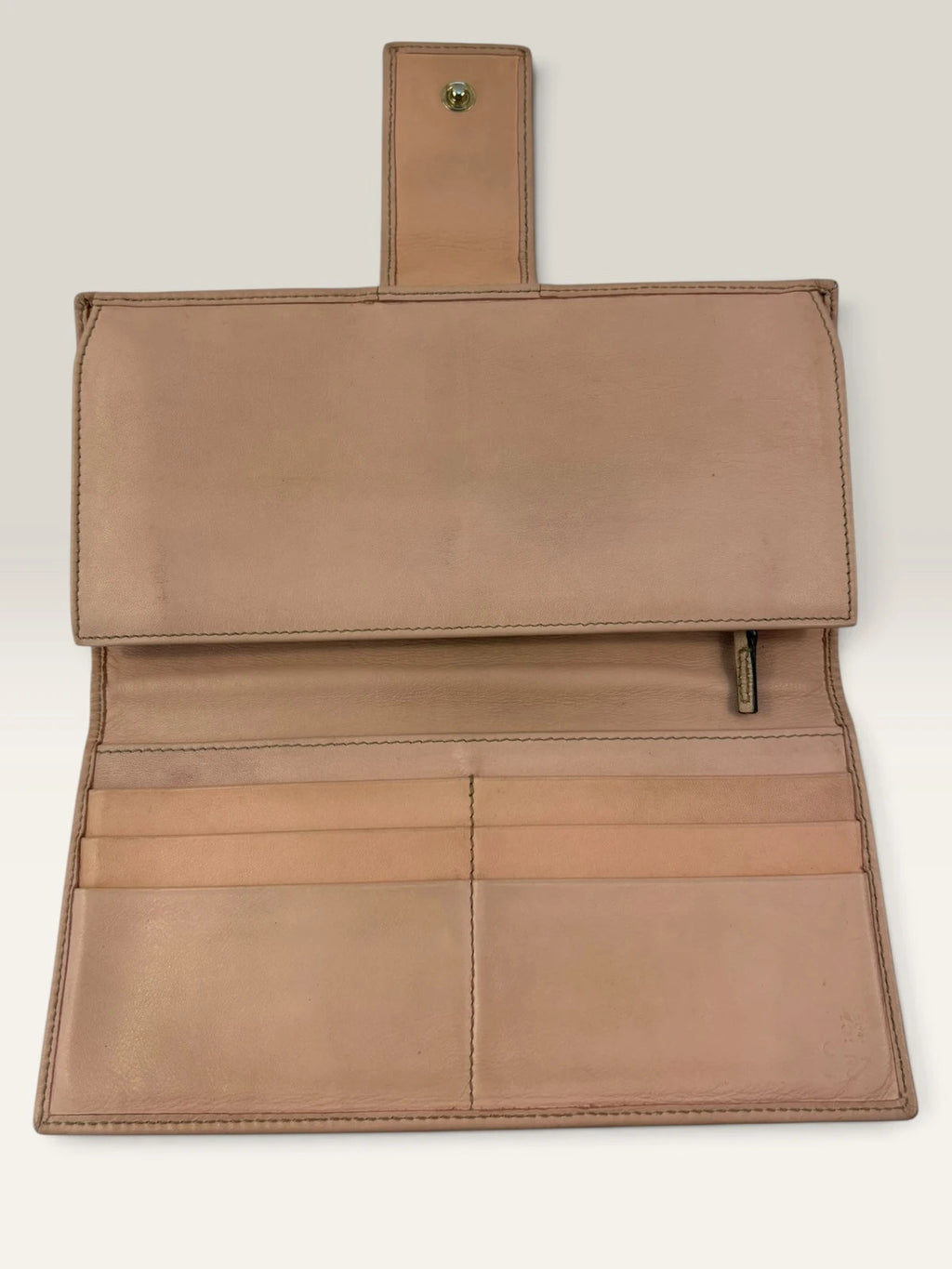 Gucci beige pink long wallet GG canvas with gold-tone Horsebit clasp and leather trim.