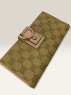 Gucci beige pink long wallet GG canvas with gold-tone Horsebit clasp and leather trim.