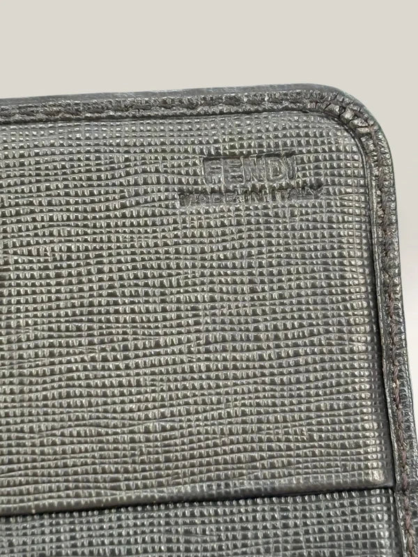 Fendi brown long wallet purse with Zucca FF monogram and gold-tone logo hardware.