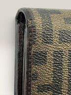Fendi brown long wallet purse with Zucca FF monogram and gold-tone logo hardware.