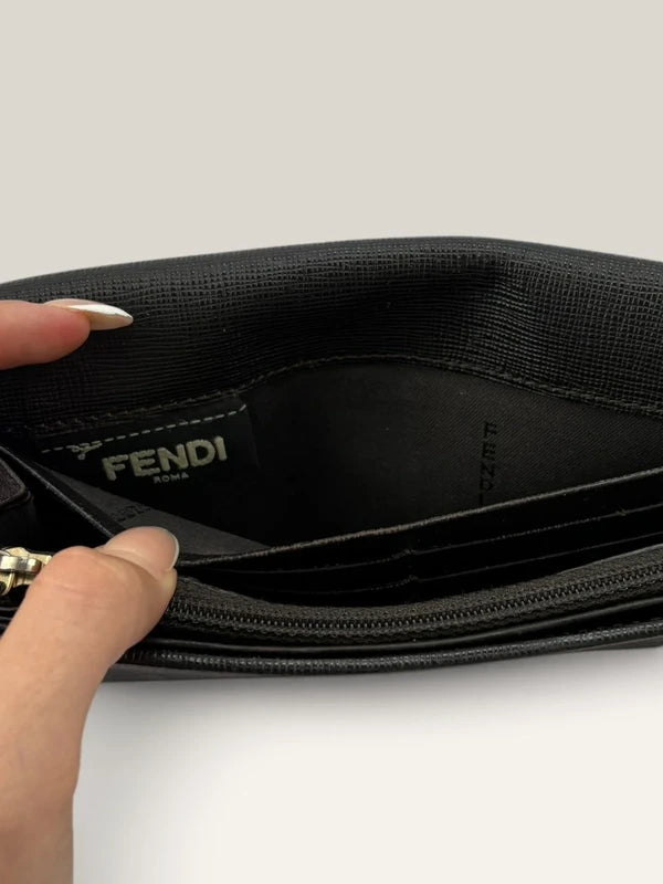 Fendi brown long wallet purse with Zucca FF monogram and gold-tone logo hardware.
