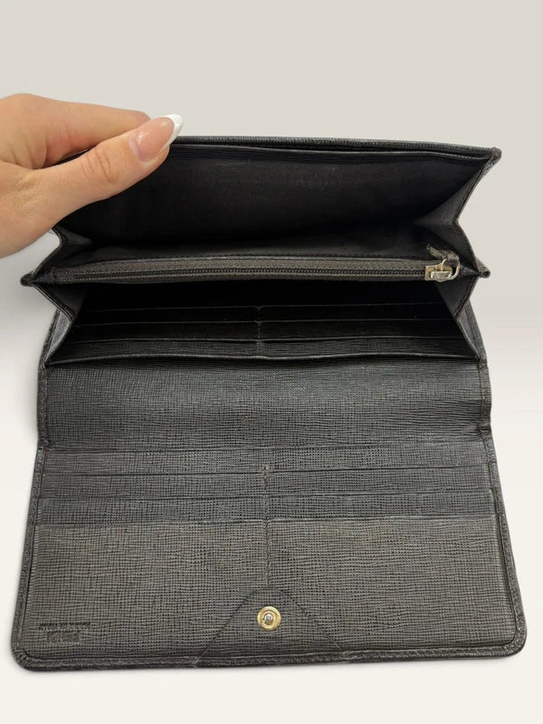 Fendi brown long wallet purse with Zucca FF monogram and gold-tone logo hardware.