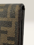 Fendi brown long wallet purse with Zucca FF monogram and gold-tone logo hardware.