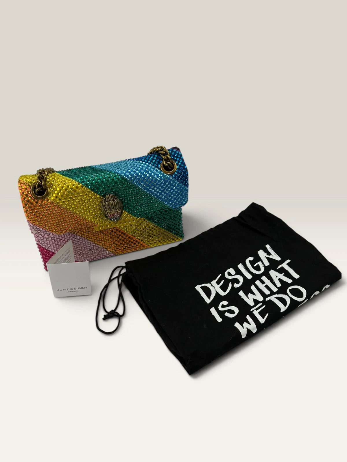 Kurt Geiger multi crossbody bag with rainbow crystal embellishments and eagle head hardware.