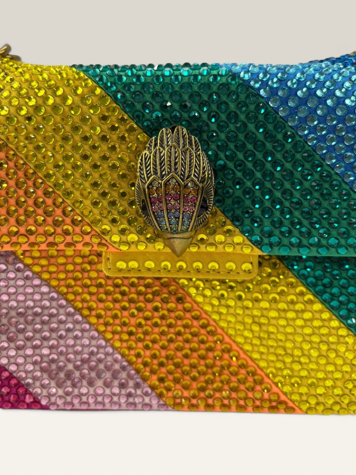 Kurt Geiger multi crossbody bag with rainbow crystal embellishments and eagle head hardware.