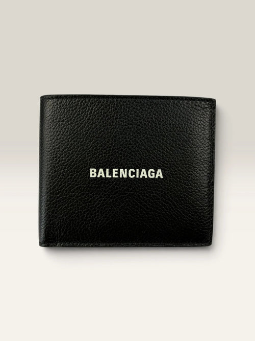 Balenciaga black bifold wallet grained leather with white cash logo print.