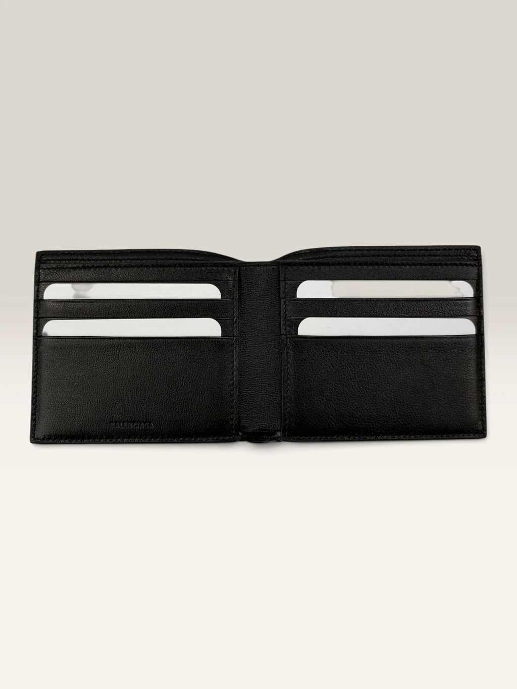Balenciaga black bifold wallet grained leather with white cash logo print.