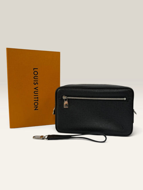 Louis Vuitton black leather clutch bag with silver-tone hardware and detachable wrist strap.