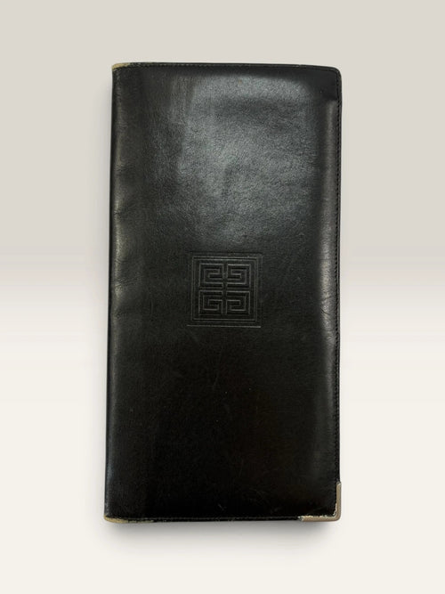 Givenchy black leather wallet embossed 4G logo, smooth texture, vintage condition.
