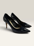 Dior navy blue stiletto heels in suede and patent leather with pointed toe design.