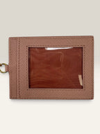 Prada pink leather wallet with structured bow detail and gold-tone hardware.