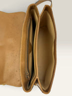 Gucci beige GG monogram canvas shoulder bag with brown leather trim and gold-tone hardware.