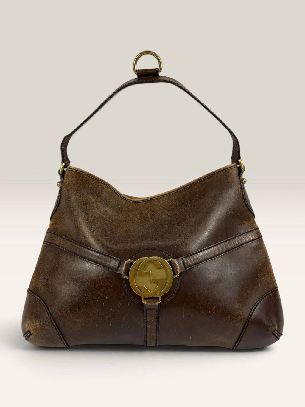 Gucci brown leather shoulder bag oversized interlocking GG logo gold hardware vintage patina