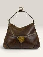 Gucci brown leather shoulder bag oversized interlocking GG logo gold hardware vintage patina
