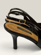 Louis Vuitton slingback heels black and brown patent leather with Damier checkerboard pattern.