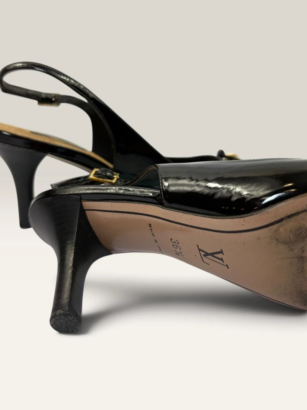 Louis Vuitton slingback heels black and brown patent leather with Damier checkerboard pattern.