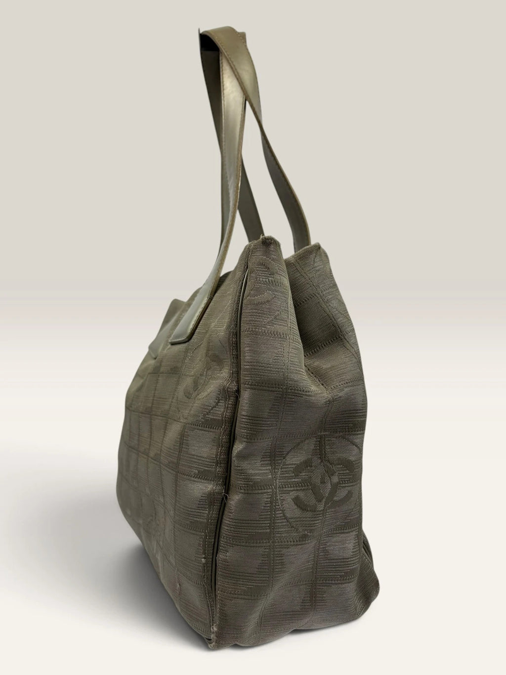 Chanel grey jacquard nylon tote with interlocking CC logo and leather shoulder straps.