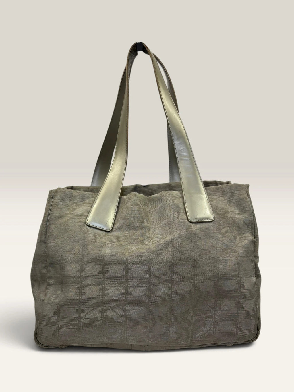 Chanel grey jacquard nylon tote with interlocking CC logo and leather shoulder straps.