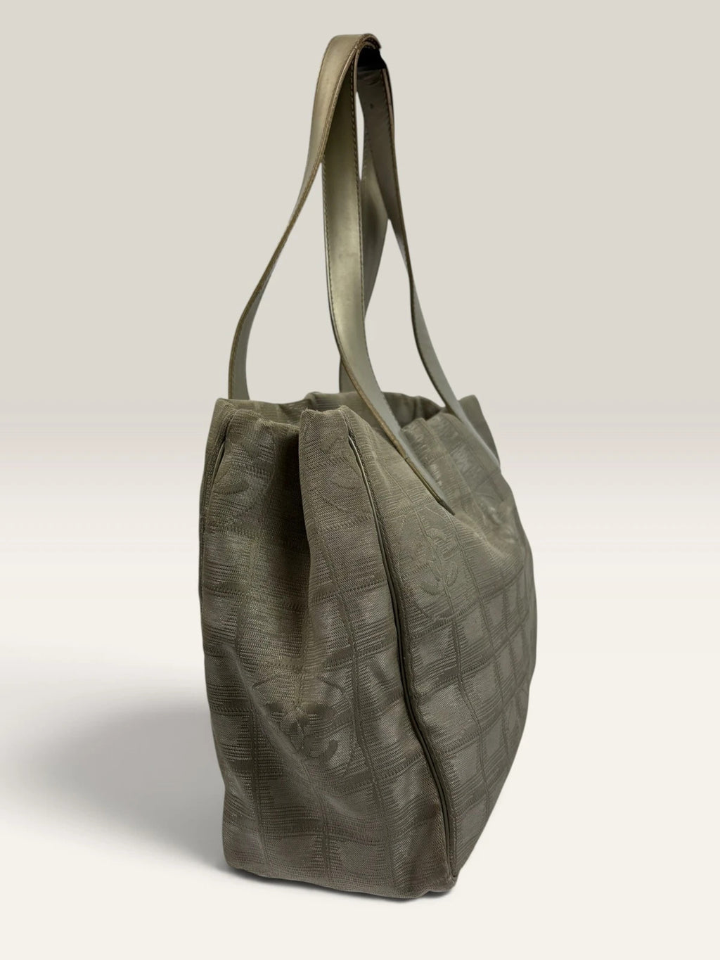 Chanel grey jacquard nylon tote with interlocking CC logo and leather shoulder straps.