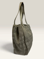 Chanel grey jacquard nylon tote with interlocking CC logo and leather shoulder straps.