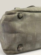 Chanel grey jacquard nylon tote with interlocking CC logo and leather shoulder straps.