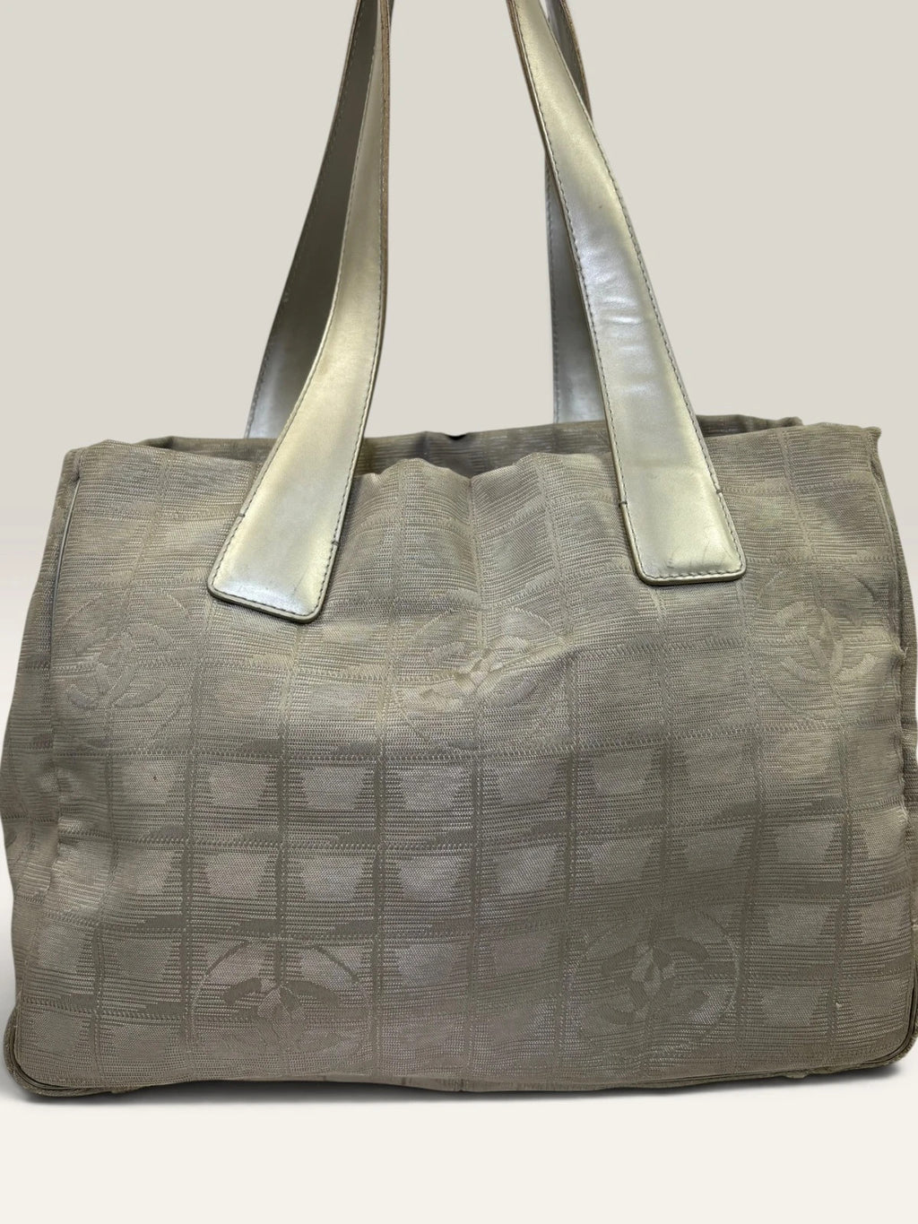 Chanel grey jacquard nylon tote with interlocking CC logo and leather shoulder straps.