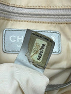 Chanel grey jacquard nylon tote with interlocking CC logo and leather shoulder straps.