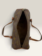 Louis Vuitton Papillon 30 handbag brown monogram canvas with natural leather trim and handles.