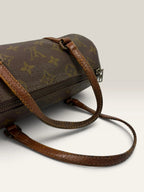 Louis Vuitton Papillon 30 handbag brown monogram canvas with natural leather trim and handles.
